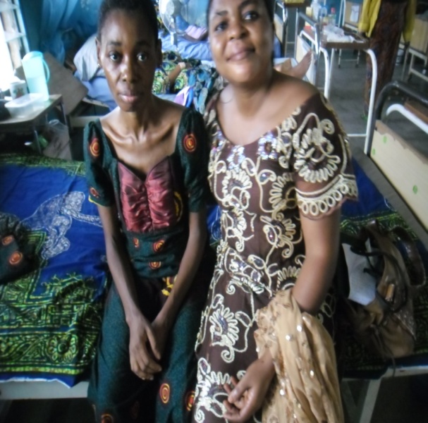 SOWCHAN National Secretary visits a client in hospital during hospital care and support.