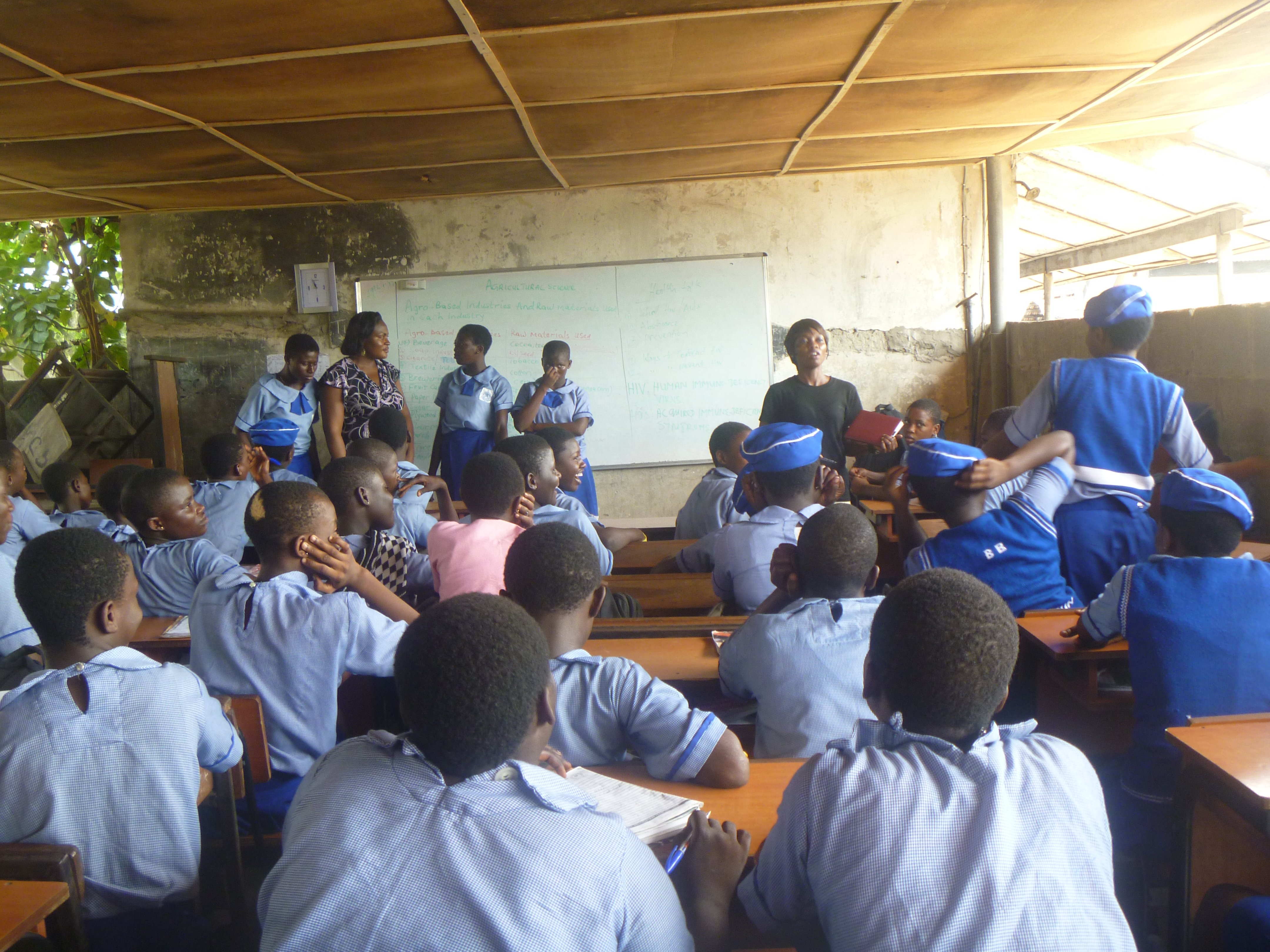 SOWCHAN trained volunteers teaching in-school girls on sexual and reproductive health education.