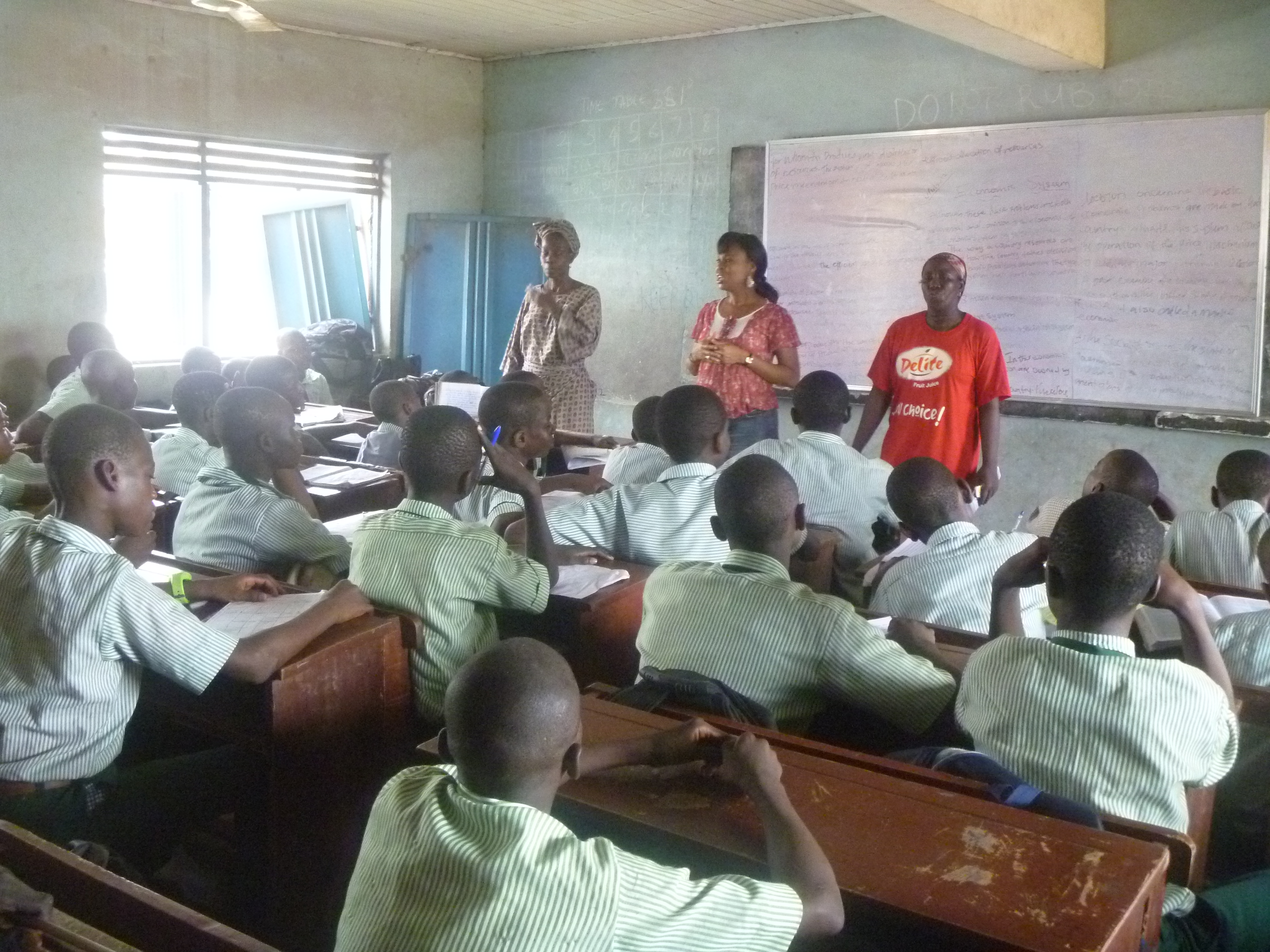 SOWCHAN trained volunteers teaching in-school girls on sexual and reproductive health.